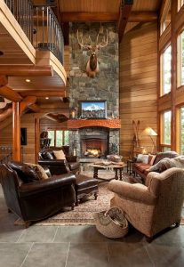 The master bedroom and great room of this PrecisionCraft Oregon residence, share a chimney